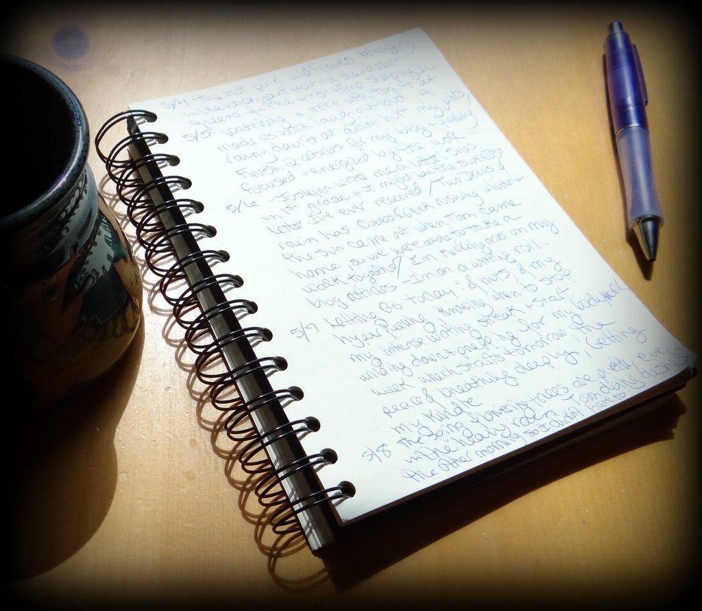 photo of journal and pen