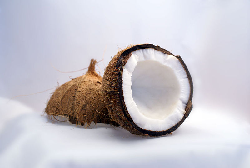 a raw coconut, cut in half