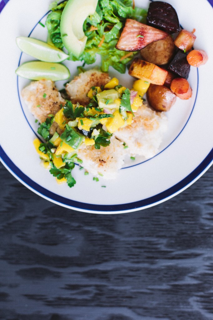 cooked recipe displayed on white plate with blue trim