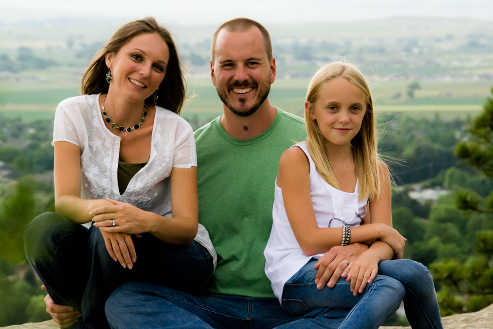 Angie with her husband and daughter