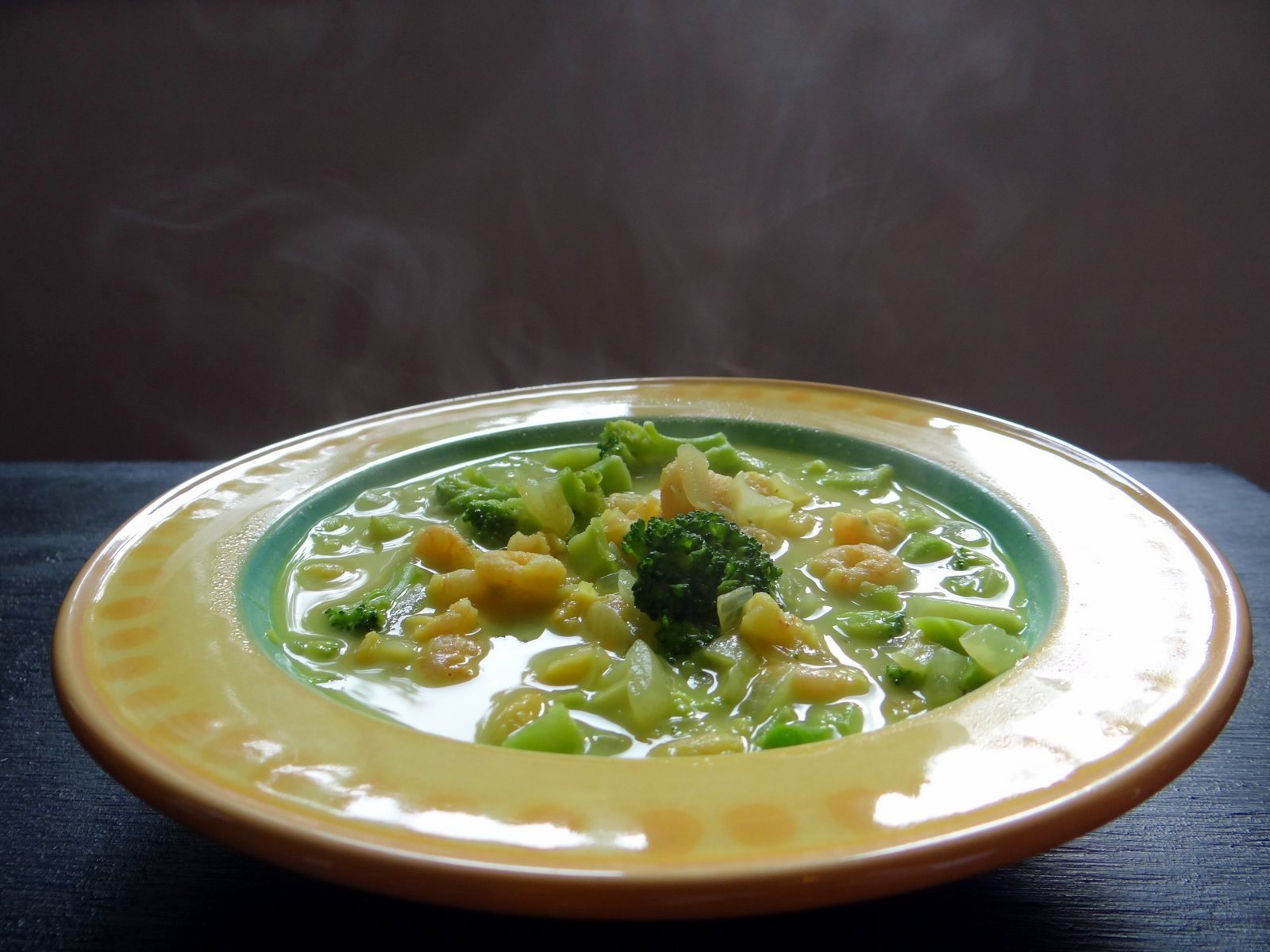 recipe served in a yellow bowl, with steam rising