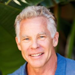 Headshot photo of Mark, smiling