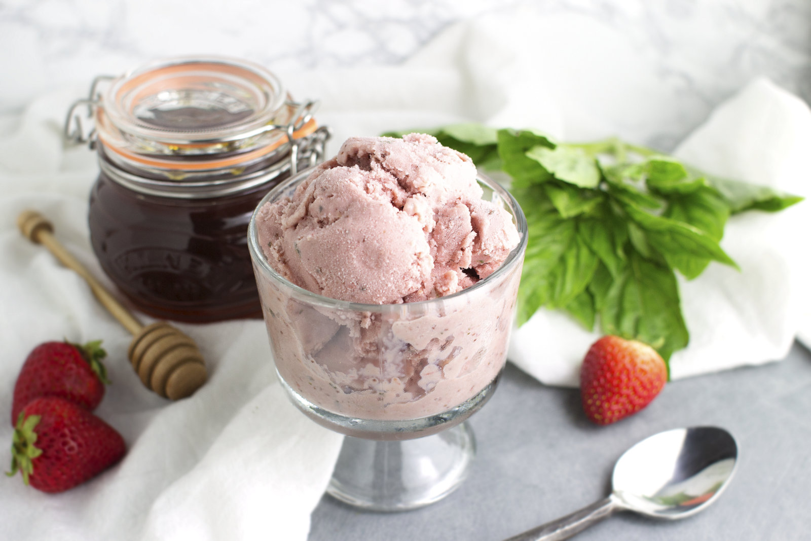 a bowl of the ice cream with the ingredients artfully arranged around it