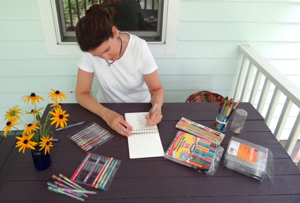 Me and my art supplies at my purple picnic table