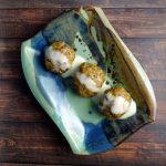 meatballs served on blue and green dish