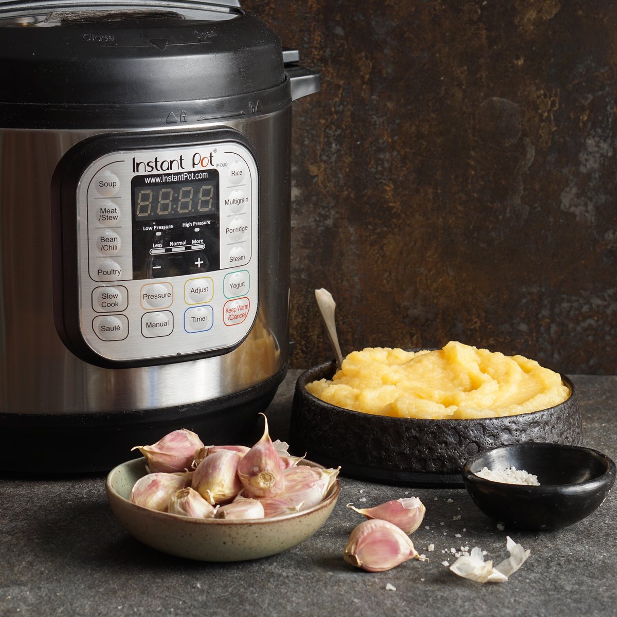 photo of instant pot with bowl of mashed rutabaga alongside