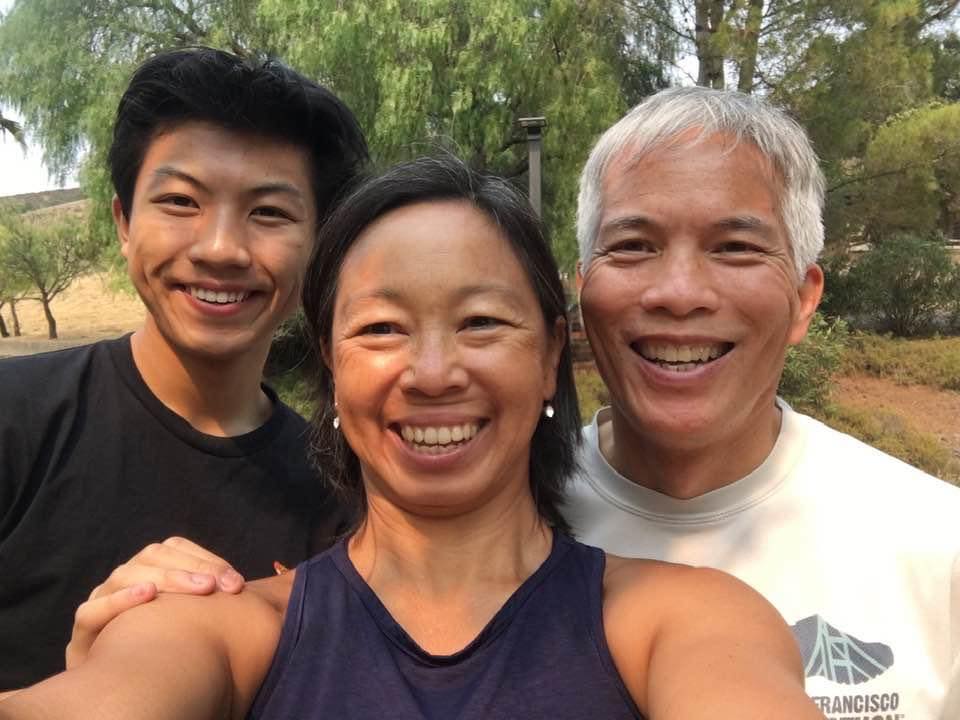 Elise with her husband and son - all smiling