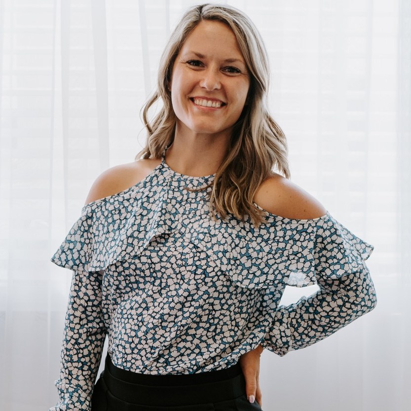 Dr. Gretchen Hawley smiling with long blond hair