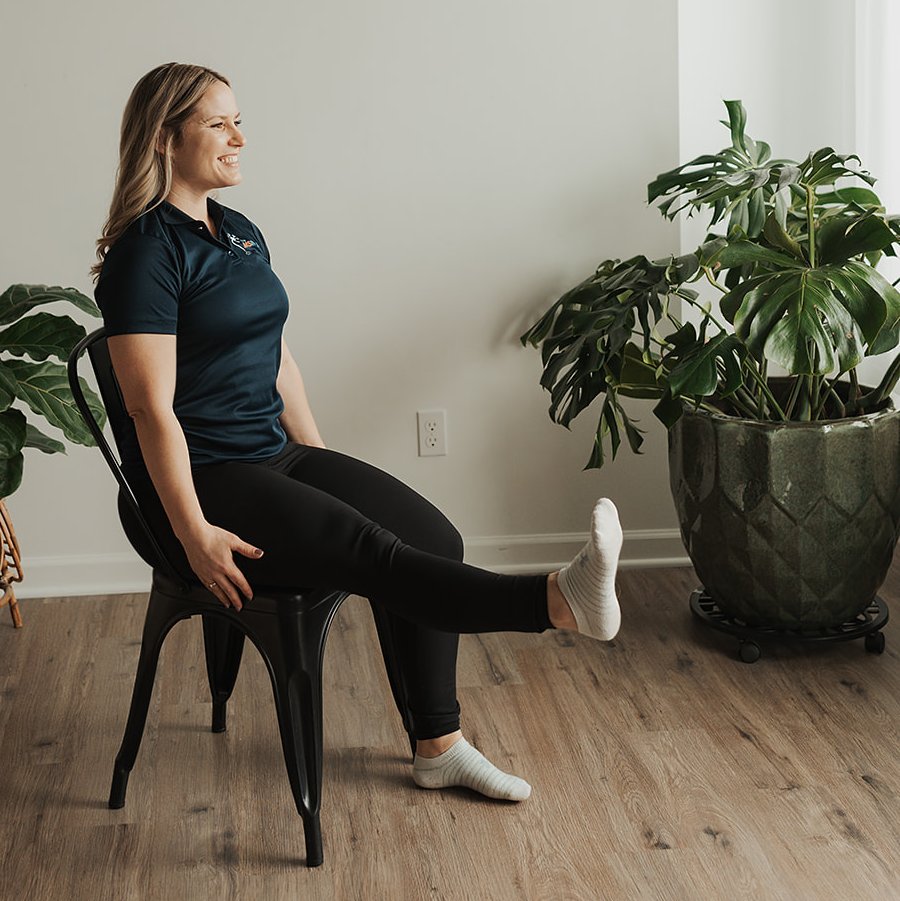 Gretchen demonstrating a seated leg kick